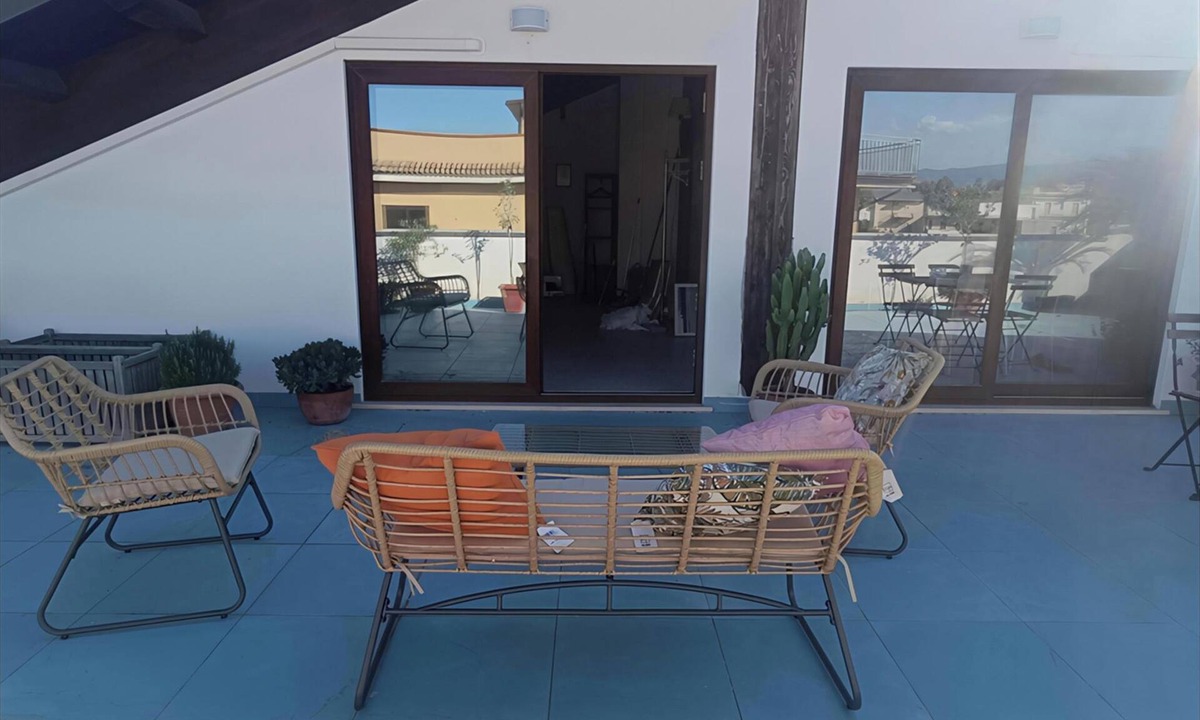 Locri Apartment | Air-conditioned attic room with large terrace