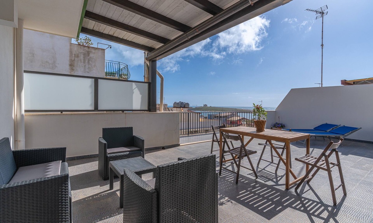 Portopalo di Capo Passero Apartment | Apartment 'Plutone with Sea View Terrace', Wi-Fi and Air Conditioning
