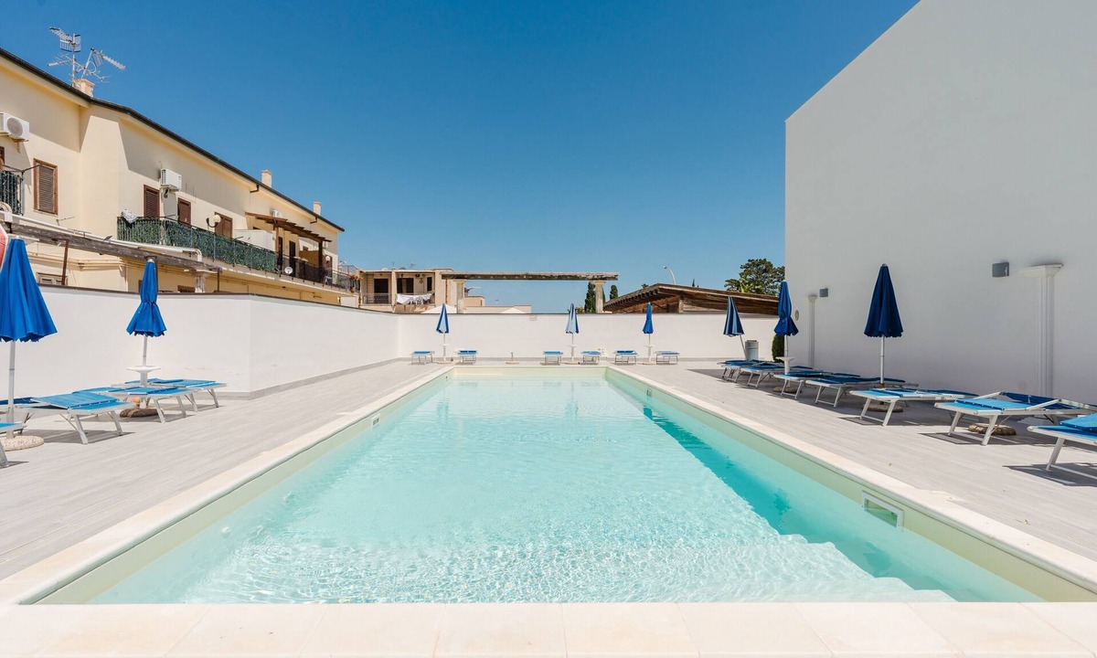 San Vito Lo Capo Apartment | Apartment 'Kairos' with Shared Pool, Wi-Fi and Air Conditioning