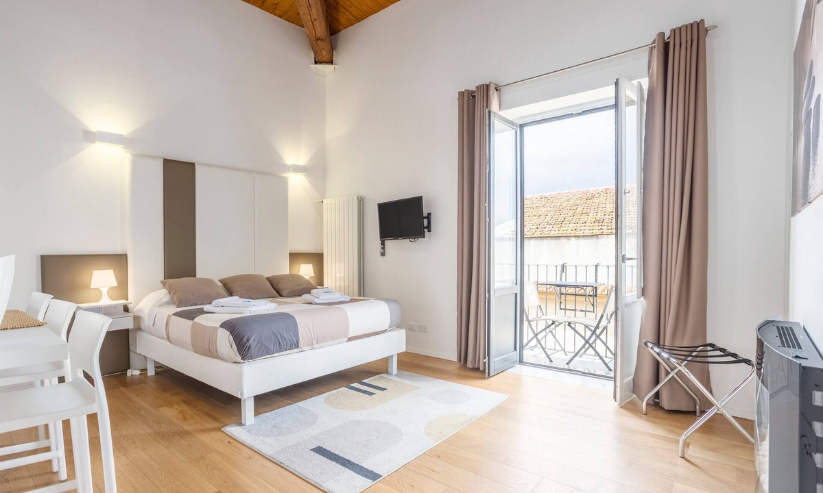 Albergheria Apartment | Apartment 'Melo' with Balcony, Wi-Fi and Air Conditioning