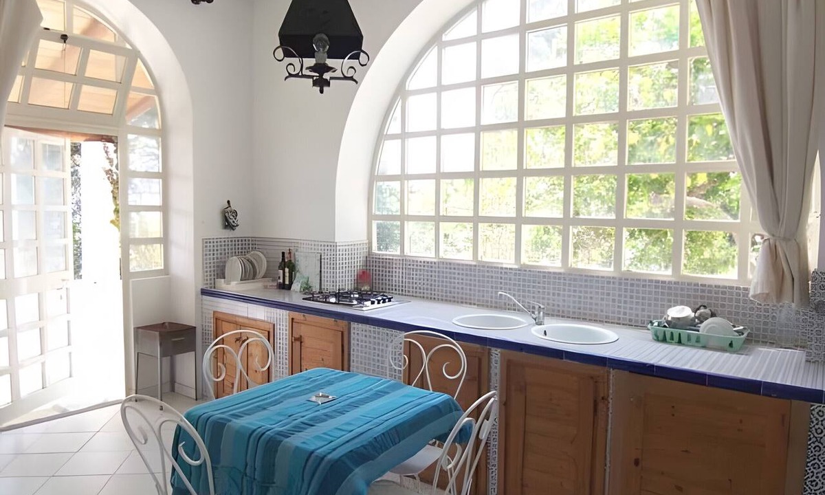 Lingua Apartment | Apartment 'Quadara - Il Nido' with Sea View, Private Terrace and Shared Garden