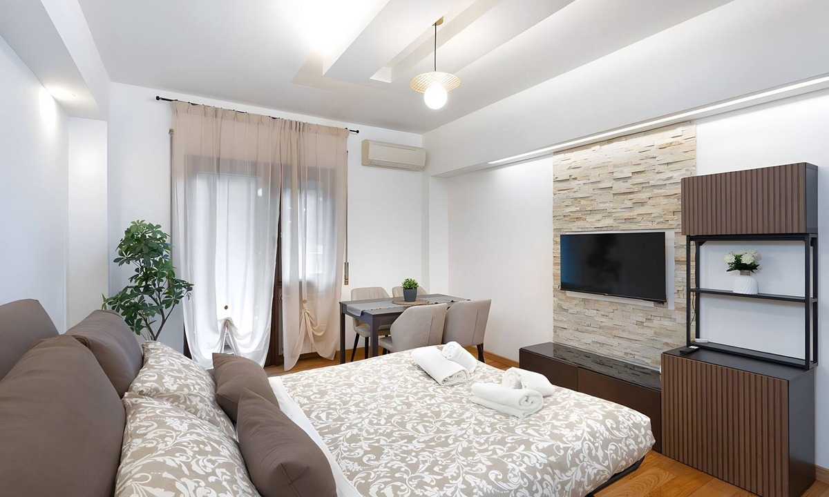 Garbatella Apartment | Apartment 'Your Place in Italy - Rome Apt 2' with Balcony, Wi-Fi and Air Conditioning