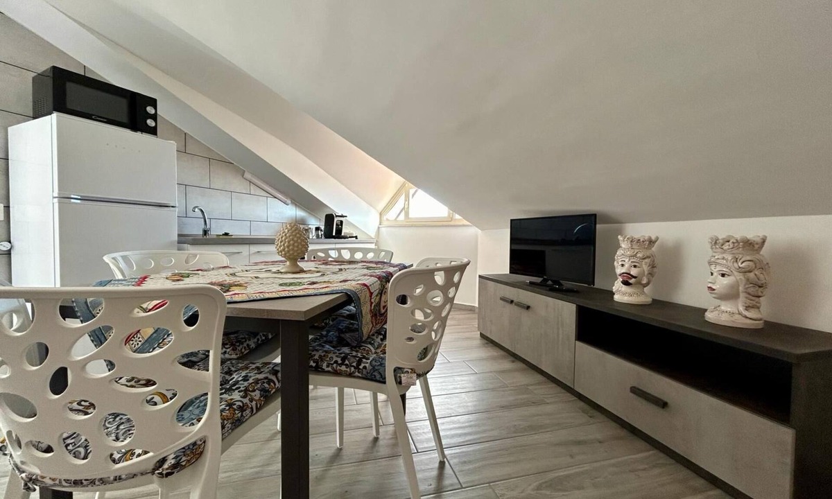 Aci Sant'Antonio Apartment | Attic room is unique and cozy in the center of the village.