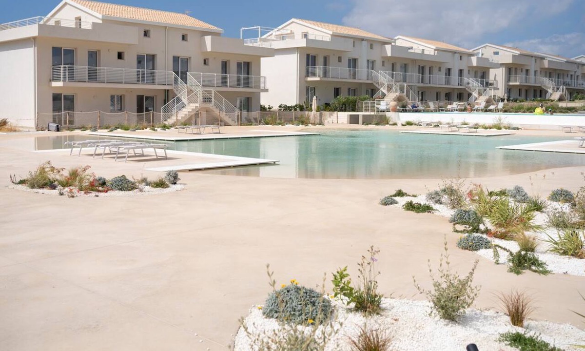 Pachino Apartment | Charming two-level apartment, accommodating up to 5 people, located within the renowned Borgo 84 residence, featuring two swimming pools and a bike path. The property is located just 3 km from the center of Marzamemi, one of the most fascinating seaside