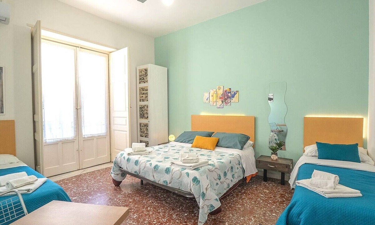 Old Town Apartment | Historic Sicilian Home for 10 Guests with Balconies in Old Town Catania
