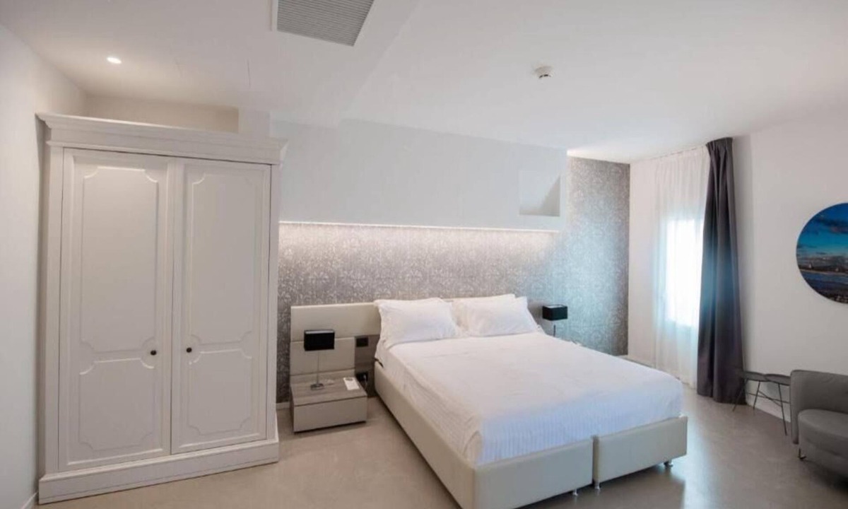 Aci Trezza Hotel | Elegant Bedroom w/Panoramic Balcony by the Sicilian Coastline