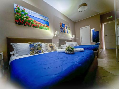 Belpasso Bed & Breakfast | "La città delle 100 sculture" B&B BcenS con parcheggio privato e trasfert H24 - Belpasso - Etna -