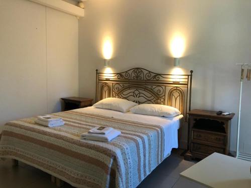 Montalto Uffugo House | le camere nel giardino dei cocomeri