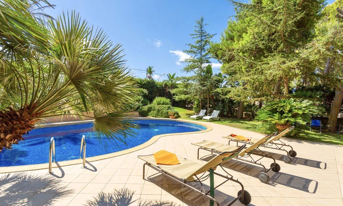 Valderice Villa | My Rental Homes - Villa Acquamarina with swimming pool surrounded by greenery