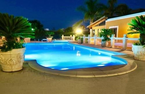 Noto Marina Villa | 2 Holiday House Noto with swimming pool,sauna,jacuzzi,garden,parking,organic garden