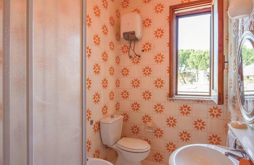 Ognina House | About 15 km from Siracusa is this vacation home with large garden surrounded by trees and native hed