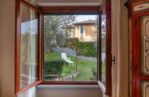 Rapallo Villa | 🏠 ACCOMMODATION DESCRIPTIONElegant panoramic house in Rapallo, spread over two main floors with a basement featuring a tavern area and laundry room. Surrounded by greenery and an extensive private garden with olive trees and Mediterranean vegetation,