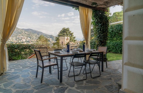 Rapallo Villa | 🏠 ACCOMMODATION DESCRIPTIONElegant panoramic house in Rapallo, spread over two main floors with a basement featuring a tavern area and laundry room. Surrounded by greenery and an extensive private garden with olive trees and Mediterranean vegetation,