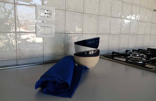Locri Apartment | Air-conditioned attic room with large terrace
