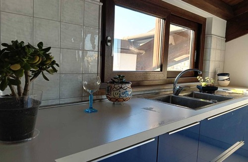 Locri Apartment | Air-conditioned attic room with large terrace