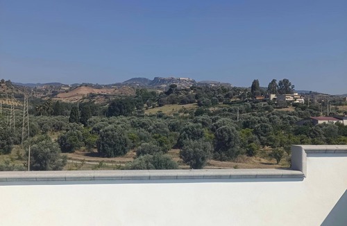 Locri Apartment | Air-conditioned attic room with large terrace