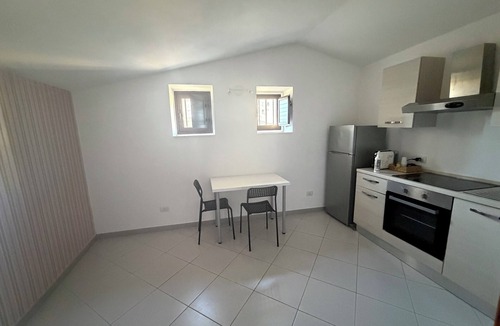 Caltagirone Apartment | An elegant retreat overlooking the city of mosaics