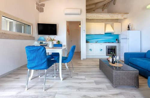 Trinita d'Agultu e Vignola Apartment | Apartment 'Borgo Del Mare 1' with Sea View, Private Pool and Air Conditioning