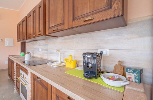 Granelli Apartment | Apartment 'Gelso' with Private Terrace, Wi-Fi, Air Conditioning, and EV Charging Station