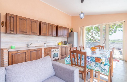 Granelli Apartment | Apartment 'Gelso' with Private Terrace, Wi-Fi, Air Conditioning, and EV Charging Station