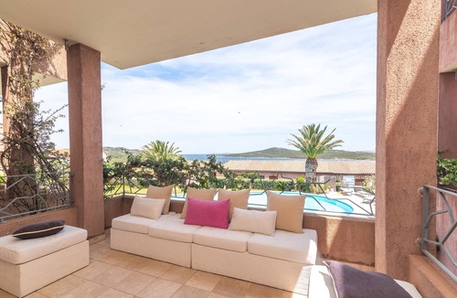 Porto Pozzo Apartment | Apartment 'Il Fiordo 17' with Sea View, Shared Pool and Air Conditioning