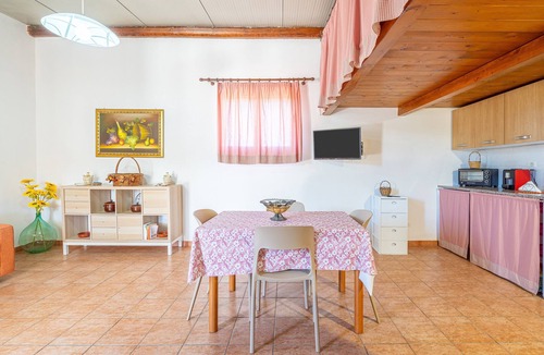 Granelli Apartment | Apartment 'Nonna Rosa' with Private Terrace, Shared Garden and Air Conditioning