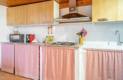 Granelli Apartment | Apartment 'Nonna Rosa' with Private Terrace, Shared Garden and Air Conditioning