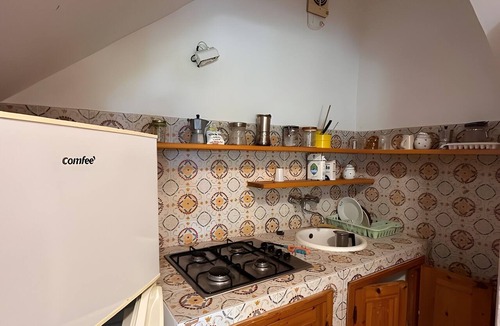 Lingua Apartment | Apartment 'Quadara - Il Rifugio' with Sea View, Private Terrace and Shared Garden