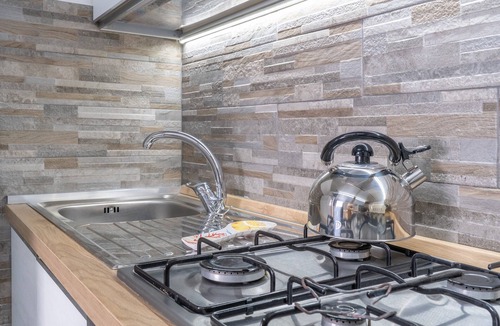 Agnone Bagni Apartment | Apartment 'Trifamiliare Garden - Sole' with Private Terrace, Wi-Fi and Air Conditioning