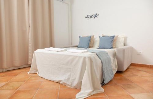 Porto Pozzo Apartment | Appartamento Bilocale "Leone VI" - 4 Ospiti - Terrazza Privata & FREE Parking