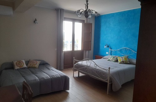 Calatabiano House | Arcobaleno dell'Etna - Family Room with terrace and Etna-sea view
