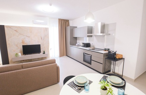 Marcianise Apartment | ARQO Comfort Apartment – One Bedroom with Living Room