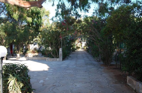 Caucana-finaiti-casuzze-finaiti Nord House | Available July 4–18: CASA ROSSA with a garden overlooking the sea