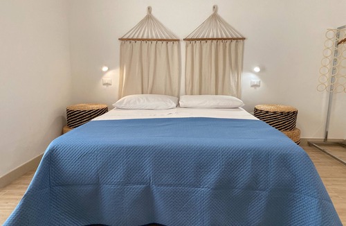Sant'Isidoro Bed & Breakfast | Bed and Breakfast 'Isid'Oro Rooms - Camera 1' with Balcony, Wi-Fi and Air Conditioning
