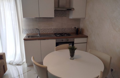 Calatabiano Apartment | Bouganville Residence - Family suite with swimming pool, tennis court, playground.