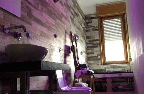 Torre del Greco Condo | CasaCondo @Flora: Relax in a Spacious Condo with Jacuzzi - Your Naples Getaway