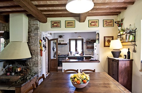 Monte Castello di Vibio Villa | Casale chimneys immersed in olive trees