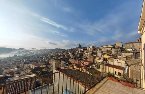 Caltagirone Apartment | Comfort, style and views: your perfect stay at Civico24rooms