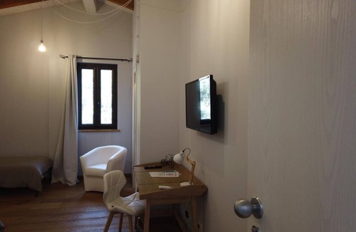 Amantea Bed & Breakfast | Cozy room, surrounded by greenery and from a breathtaking view