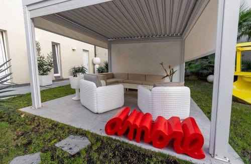 Albergheria Apartment | Deluxe apartment with private garden in the historic center