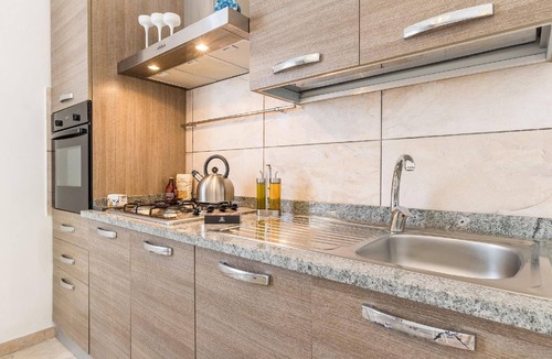 Santa Maria del Focallo House | Edoné, apartment facing a sandy beach