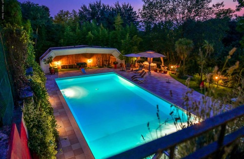 Nord-Ovest Villa | Elegant villa with a park, large private pool, outdoor games, and fitness facilities