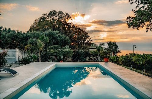 Ricadi Villa | Enotria Villas - Tramonto sullo Stromboli