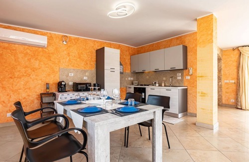 Aci San Filippo Apartment | GuestHost - Comfortable 80 sqm apartment in Aci Catena, located on the third floor without an elevator. Equipped with WiFi, air conditioning, and a large terrace ideal for outdoor relaxation. Aci Catena is a quiet Sicilian town rich in history and cultur