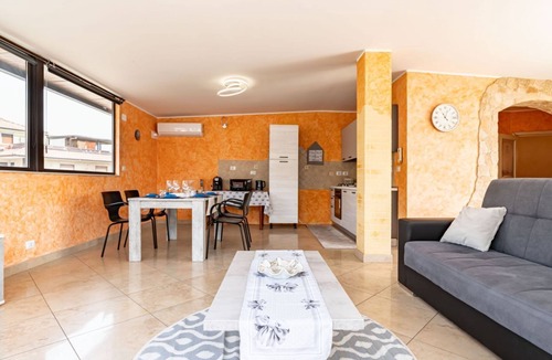 Aci San Filippo Apartment | GuestHost - Comfortable 80 sqm apartment in Aci Catena, located on the third floor without an elevator. Equipped with WiFi, air conditioning, and a large terrace ideal for outdoor relaxation. Aci Catena is a quiet Sicilian town rich in history and cultur
