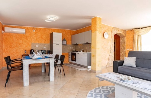 Aci San Filippo Apartment | GuestHost - Comfortable 80 sqm apartment in Aci Catena, located on the third floor without an elevator. Equipped with WiFi, air conditioning, and a large terrace ideal for outdoor relaxation. Aci Catena is a quiet Sicilian town rich in history and cultur