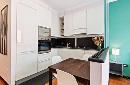 Genoa Apartment | GuestHost - Nice and bright studio apartment in the heart of the Old Port of Genoa, with large panoramic windows overlooking the dock. The apartment is only 300m from the Darsena underground and 800m from the Principe Square railway station. The Genoa Aq