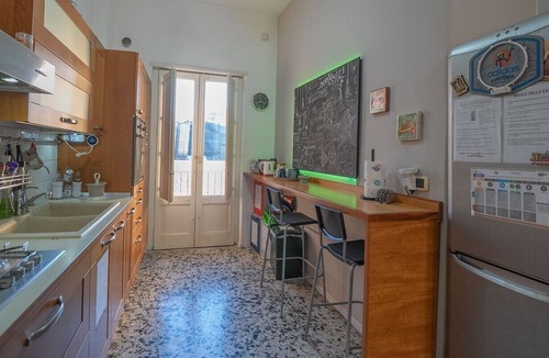 Old Town Apartment | Historic Sicilian Home for 10 Guests with Balconies in Old Town Catania
