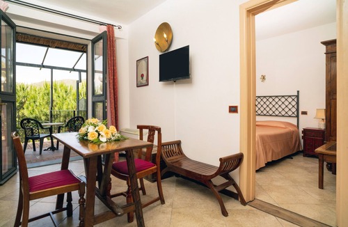 Castelmola Apartment | Holiday Apartment 'Garden Cottage I Dammusi - Arancio' with Mountain View, Shared Pool & Wi-Fi