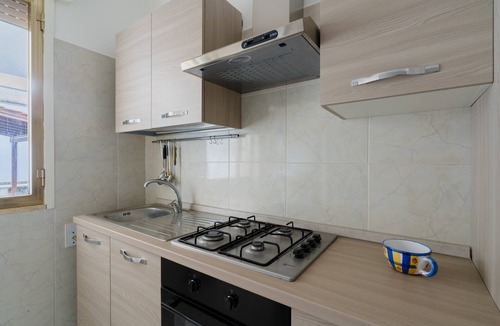 Sant'Isidoro House | Holiday Home 'Isidoro Home Holidays' with Shared Garden and Air Conditioning